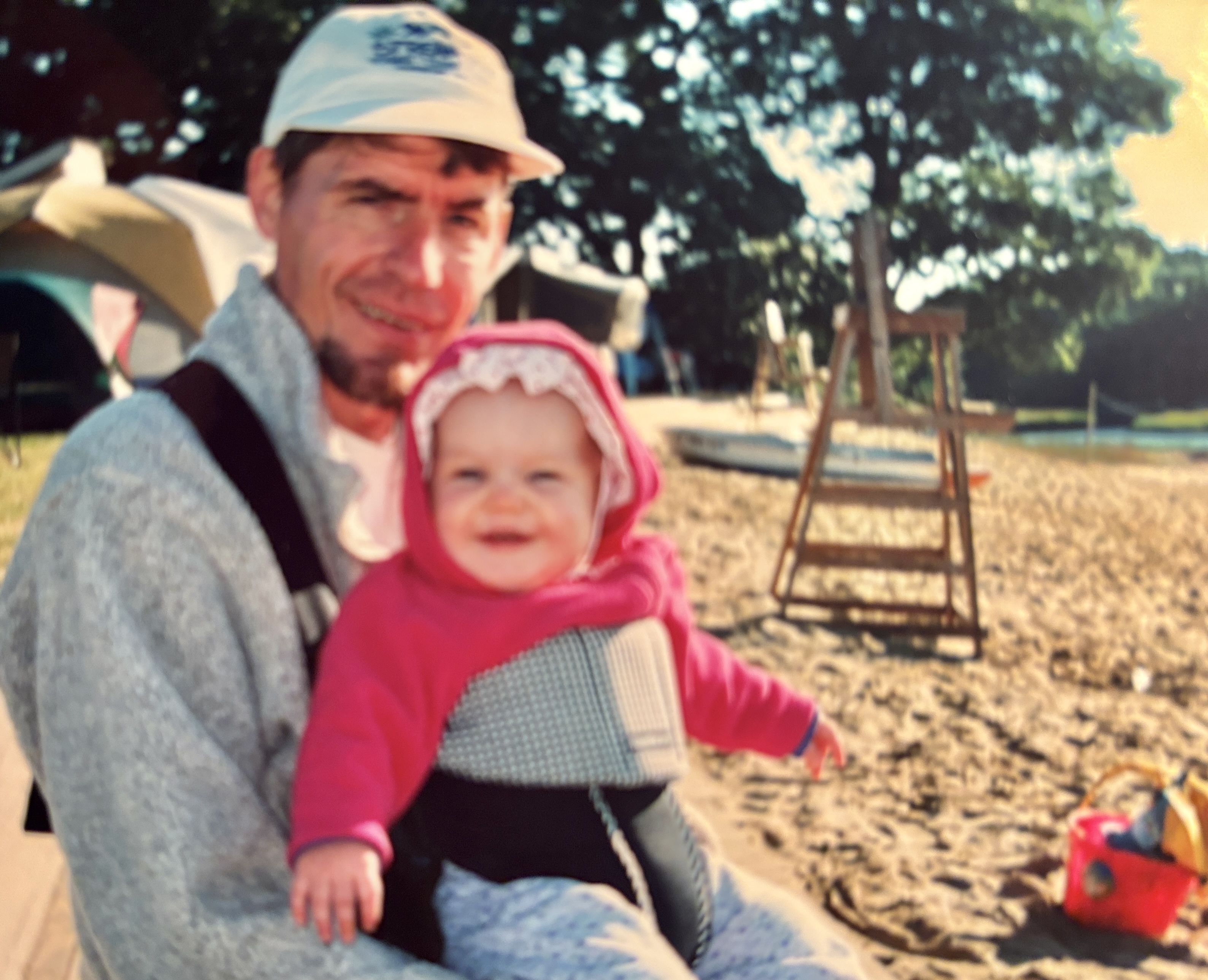 Dad and daughter bundled up for July at Thomas Point Beach.